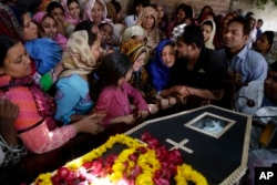 FILE - Pakistani Christian women mourn a victim of a bombing attack in Lahore, Pakistan, March 28, 2016.