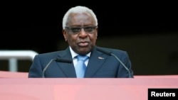FILE - Lamine Diack speaks during the opening ceremony of the 15th IAAF World Championships at the National Stadium in Beijing, China, Aug. 22, 2015. 