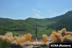 FILE - The intercontinental ballistic missile Hwasong-14 is seen during its test launch in this undated photo released by North Korea's Korean Central News Agency (KCNA) in Pyongyang, July, 4 2017.