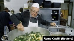 Dino Impagliazzo, Rome's 90-year-old 'chef of the poor', stirs a soup which he cooks for the homeless living in the city and outside the Vatican, in Rome, Italy, January 18, 2020