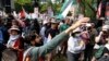 Estudiantes universitarios pro palestinos en la marcha en el Comité Nacional Demócrata el lunes 19 de agosto de 2024, en Chicago. AP