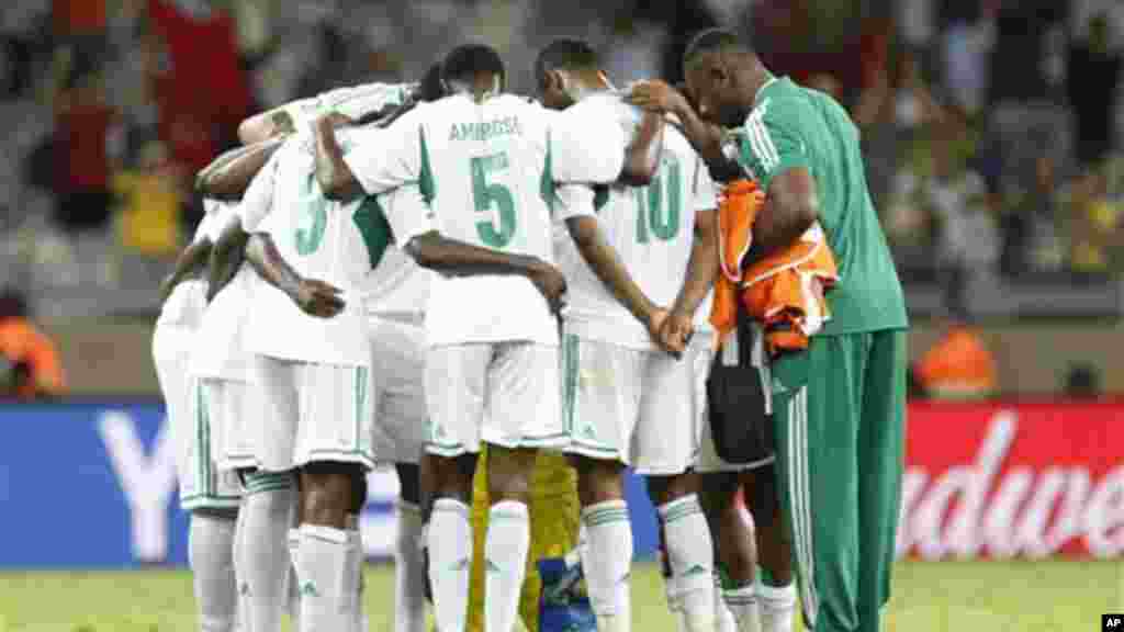 Nigeria players huddle after winning 6-1 in the Confederations Cup match between Tahiti and Nigeria.