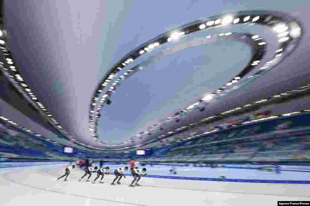 Japanese athletes take part in a training session at the National Speed Skating Oval in Beijing, China, ahead of the Beijing 2022 Winter Olympic Games.