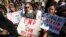 FILE - Students who walked out of their Montgomery County, Maryland, schools protest against gun violence in front of the White House in Washington, Feb. 21, 2018. 