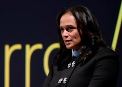 FILE - Angolan businesswoman Isabel dos Santos delivers a speech during the start of Portuguese corporation EFACEC's new electric mobility industrial unit, Feb. 5, 2018 in Maia, Portugal.