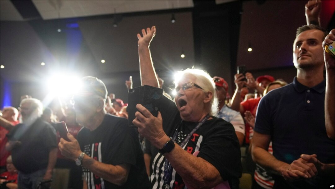 Supporters cheer as Republican presidential nominee former President Donald Trump speaks at a campaign event Sept. 28, 2024, in Prairie du Chien, Wis.