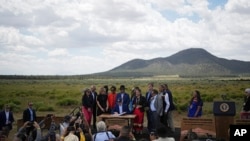 President Joe Biden signs a proclamation designating the Baaj Nwaavjo I'tah Kukveni – Ancestral Footprints of the Grand Canyon National Monument at the Red Butte Airfield Tuesday, Aug. 8, 2023, in Tusayan, Ariz. (AP Photo/John Locher)