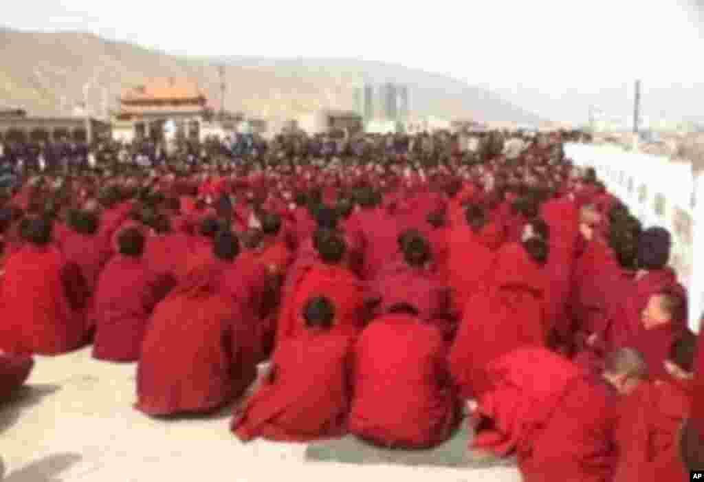 Monks gathered outside Rongpo monastery