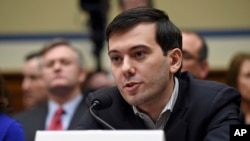 FILE- Pharmaceutical chief Martin Shkreli speaks on Capitol Hill in Washington, during the House Committee on Oversight and Reform Committee hearing on his former company's decision to raise the price of a lifesaving medicine, Feb. 4, 2016. 