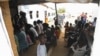 FILE - Refugees from South Sudan wait to receive treatment at the Bidibidi health center in the Northern District of Yumbe, Uganda, April 14, 2017. 