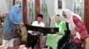Presiden Joko Widodo bersilaturahmi dengan Ibu Sinta Nuriyah dan keluarga pada haul Gus Dur, hari Jumat 7/9. (Courtesy: Setpres RI)