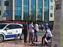 Police ended a Uighur protest and detained those participating. (Courtesy Mirzehmet Ilyasoglu)