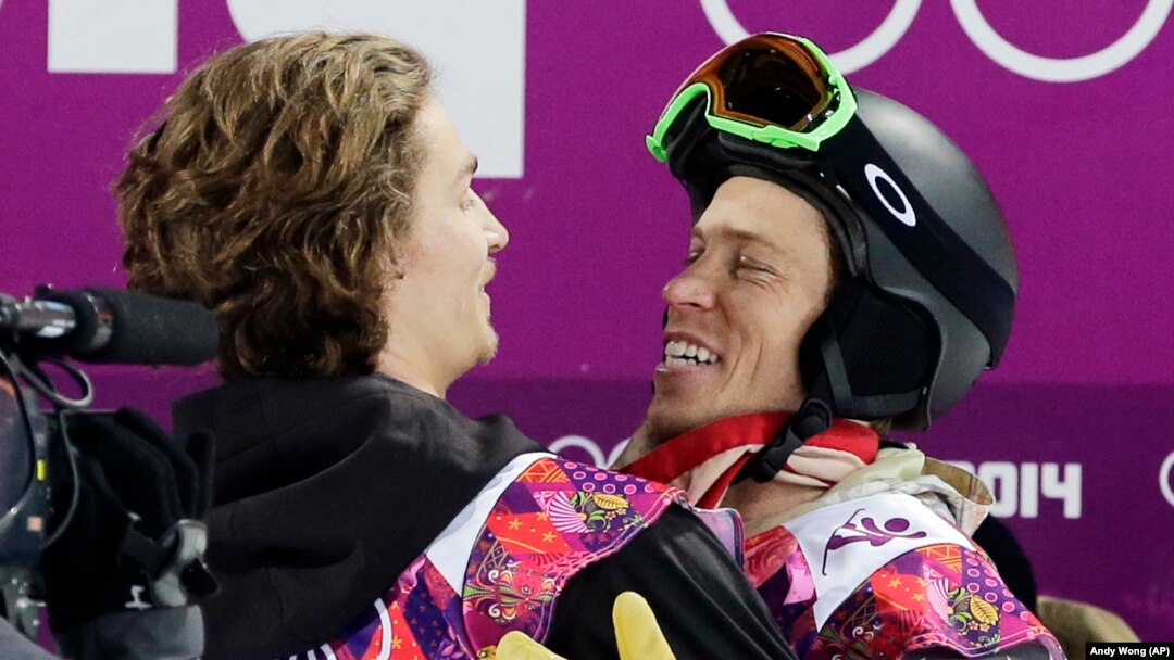 Novi i stari olimpijski šampion: Juri Podladčikov (levo) i Šon Vajt u zagrljaju