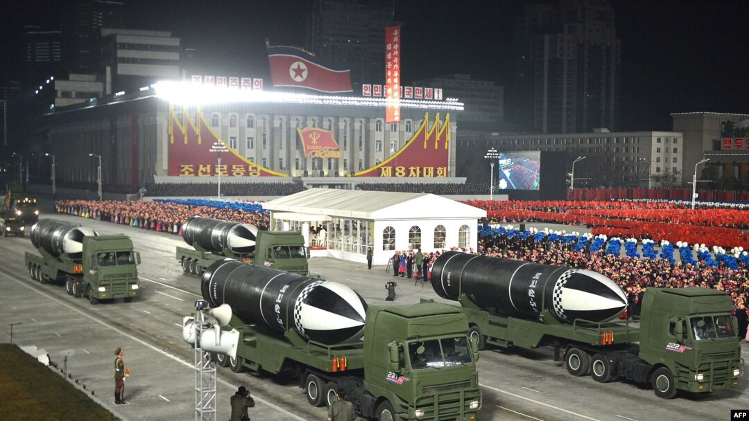 This picture taken on Jan. 14, 2021, and released by North Korea's official Korean Central News Agency shows what appears to be submarine-launched ballistic missiles during a military parade.