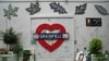 FILE - A view of the memorial wall at the Grenfell Tower in which 72 people were killed in a fire in 2017, in London, Sept. 2, 2024.