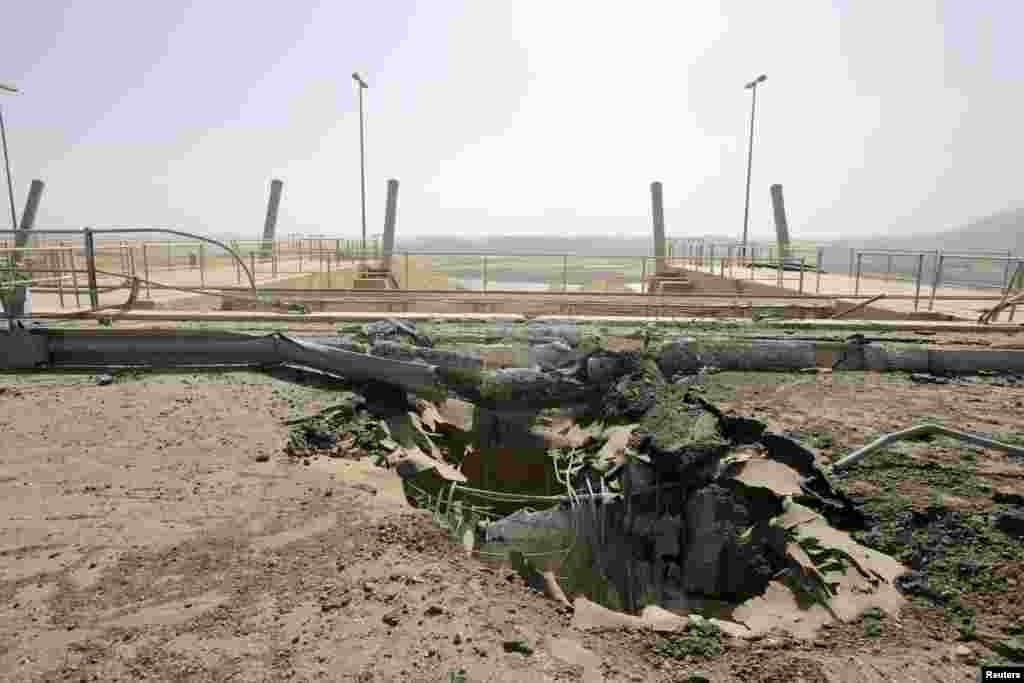 A crater at the entrance of Mosul Dam, Aug. 21, 2014.