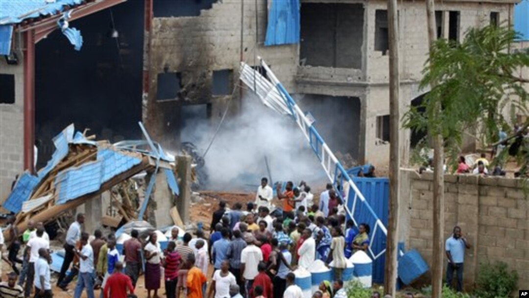 Scene outside outside a church following a blast in Kaduna, Nigeria, June 17, 2012