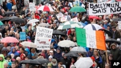 Thousands protesting Ireland's new tax on water make their way through the center of Dublin, Nov. 1, 2014.