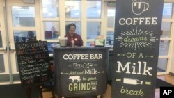 This Feb. 22, 2018 photo shows a coffee stand at Cypress Creek High School in Orlando, Fla. The school did not receive grants for the coffee bars, but the local dairy council provided signs and menu. (Orange County Public Schools via AP)