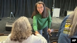 Alaska U.S. Representative Mary Peltola shakes hands after entering a campaign event in Juneau, Alaska, on Aug. 3, 2024.