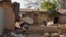 A house is left burned following an attack by gunmen in Bokkos, Nigeria, on Dec. 26, 2023. Nigerian officials and survivors say at least 140 people were killed by gunmen who attacked remote villages in north-central Nigeria's Plateau state.
