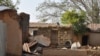 FILE - A house is left burned following an attack by gunmen in Bokkos, Nigeria, on Dec. 26, 2023. Officials said at least 140 people were killed in remote villages in Nigeria's Plateau state. A National Day of Mourning was held May 28, 2024, to honor victims of violence in 2023.