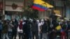 Los manifestantes participan en una protesta contra el gobierno del presidente de Colombia, Iván Duque, en Bogotá, Colombia, el 21 de enero de 2020.