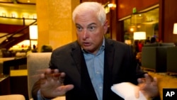 FILE - Panama's former President Ricardo Martinelli answers questions during an interview at a hotel in Guatemala City, Jan. 28, 2015. 