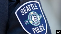 Foto ilustrasi yang menunjukkan logo dari Departemen Kepolisian Seattle dalam foto yang diambil pada 17 Juli 2016. (Foto: AP/Ted S. Warren)