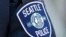 Foto ilustrasi yang menunjukkan logo dari Departemen Kepolisian Seattle dalam foto yang diambil pada 17 Juli 2016. (Foto: AP/Ted S. Warren)
