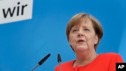 German Chancellor Angela Merkel addresses the media in Berlin, Germany, July 3, 2017.