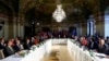 Russian Foreign Minister Sergei Lavrov (L), U.S. Secretary of State John Kerry (C) and United Nations special envoy on Syria Staffan de Mistura (R) attend the ministerial meeting on Syria in Vienna, Austria, May 17, 2016.