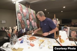 President George W. Bush is seen working on a "Portraits of Courage" painting. (Photo by Grant Miller)