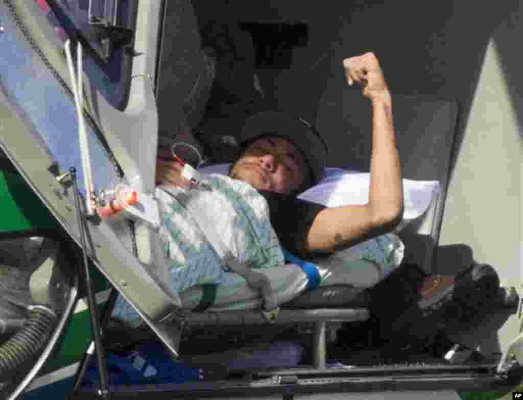 Brazil's Neymar lies inside a medical helicopter at the Granja Comary training center, in Teresopolis, Brazil, Saturday, July 5, 2014. Neymar was airlifted from Brazil's training camp Saturday and will be treated at home for his back injury. Neymar, the b