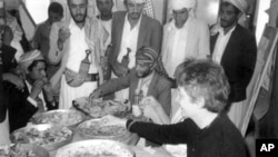 Enjoying a Yemeni meal with villagers in 1986
