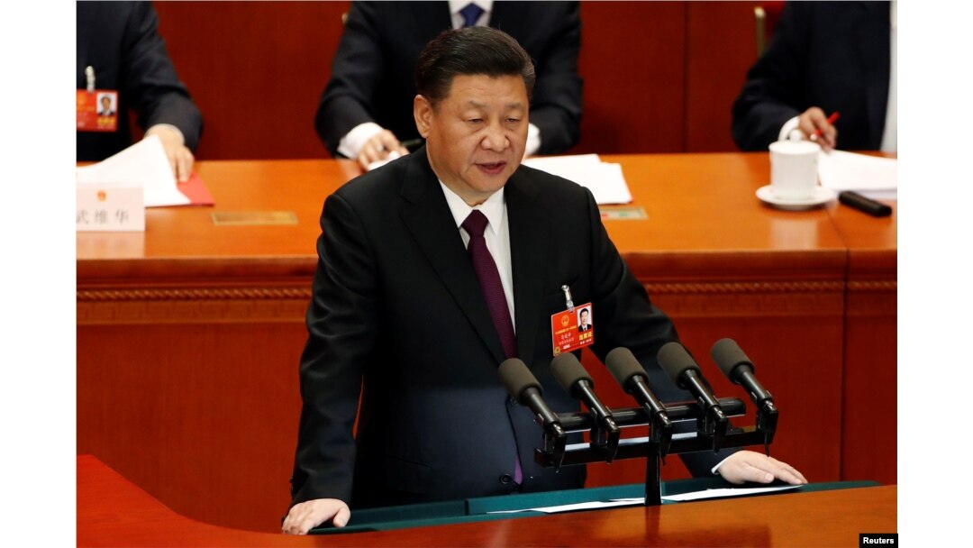 FILE - Chinese President Xi Jinping speaks at the closing session of the National People's Congress (NPC) at the Great Hall of the People in Beijing, China, March 20, 2018.
