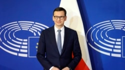 FILE - Polish Prime Minister Mateusz Morawiecki arrives for a debate on The Rule of law crisis in Poland and the primacy of EU law at the European Parliament in Strasbourg, on Oct. 19, 2021.