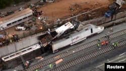 An overhead view of the wreckage of a train crash is seen near Santiago de Compostela, northwestern Spain, in this still image from video, July 25, 2013.