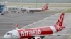 Pesawat AirAsia Airbus A320-200 terlihat di landasan Bandara Internasional Kuala Lumpur 2 (KLIA2) di Sepang, Malaysia, 4 Februari 2020. (Foto: Reuters/Lim Huey Teng)