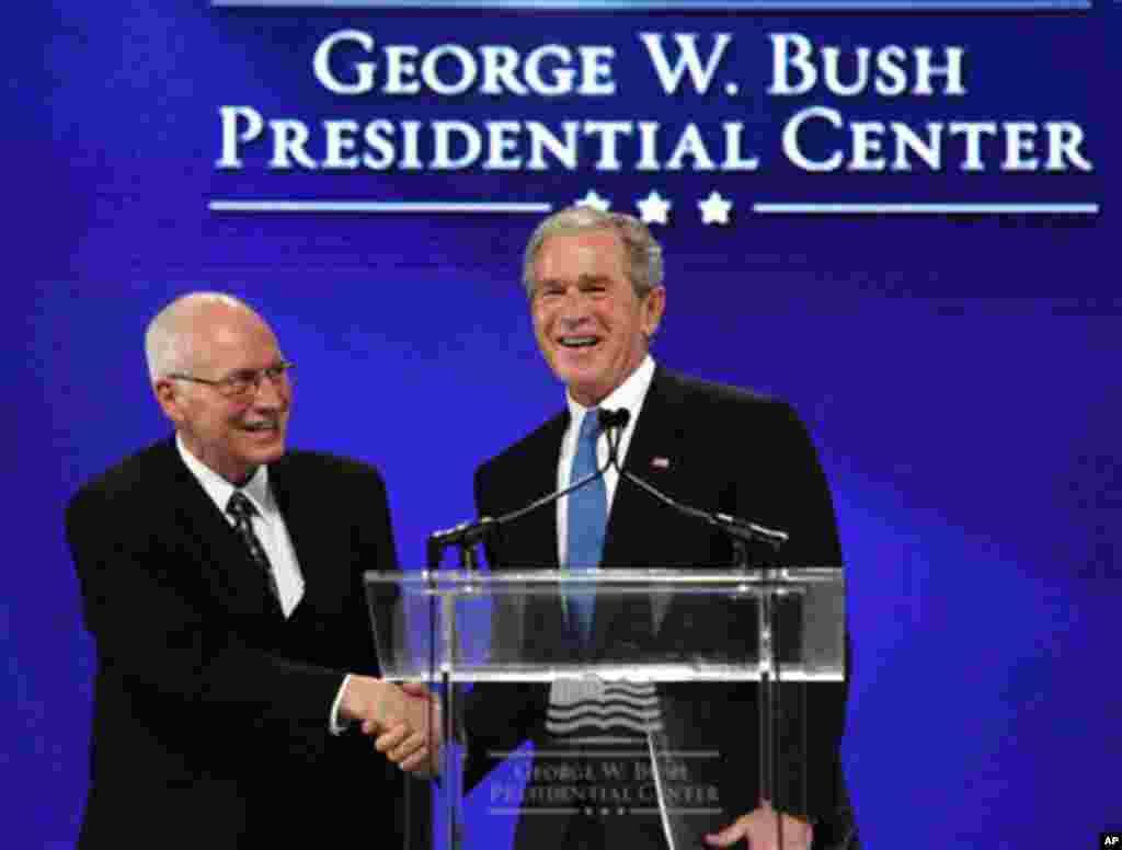 Nov. 16: Former President George W. Bush, right, shakes hands with former Vice President Dick Cheney during the groundbreaking ceremony for the George W. Bush Presidential Center in Dallas, Texas. (AP Photo/LM Otero)
