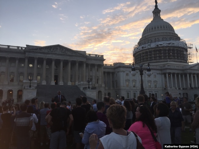 FILE - About 150-200 people gathered outside the Capitol in support of House Democrats who were holding a sit-in to force action on gun control legislation, June 22, 2016.
