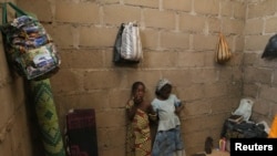 FILE - Children, who escaped Boko Haram attacks in both Michika and Cameroon, seek shelter in Adamawa, Nigeria, Jan. 31, 2015. U.S troops deployed to Cameroon to help fight the Boko Haram insurgency have donated school benches and educational material to Cameroonian schools in Feb, 2016. 