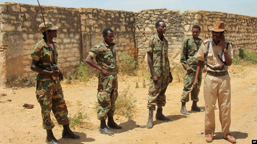 FILE - Ethiopian soldiers patrol in Baidoa, Somalia, Feb. 29, 2012, as part of the African Union peacekeeping mission known as ATMIS. In 2024, there is concern that tensions between Somalia and Ethiopia could lead to fighting between Ethiopian soldiers in Somalia and Somalis.