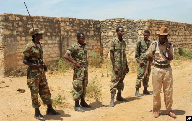 FILE - Ethiopian soldiers patrol in Baidoa, Somalia, Feb. 29, 2012. Both Ethiopia and Kenya have had troops in Somalia for years as part of an African Union mission mandate to fight al-Shabab.