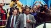 FILE - O.J. Simpson (R) and his defense attorney Daniel Leonard leave Los Angeles County Superior court in Santa Monica, Calif., Friday, Nov. 22, 1996, after testifying in the wrongful death civil trial against him. 
