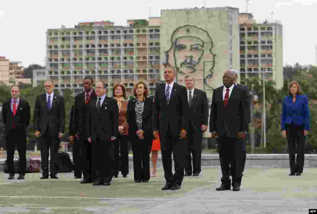 U.S. President Barack Obama (C) attends a wreath-laying ceremony at the Jose Marti monument in the Revolution Plaza in Havana next to the Vice-President of the Cuban Council Salvador Valdes Mesa (C-R).