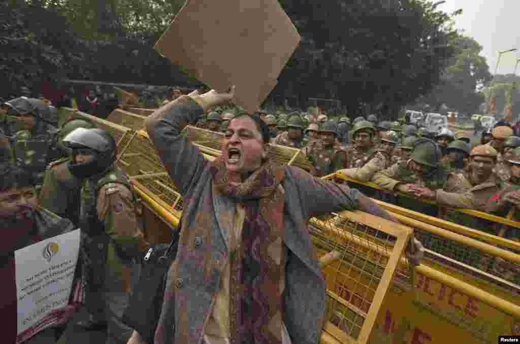 A demonstrator shouts slogans during a protest rally in New Delhi December 27, 2012. Several hundred people gathered in India's capital on Thursday in a bid to rekindle mass protests over the gang rape and ferocious beating of a young woman, who was airli