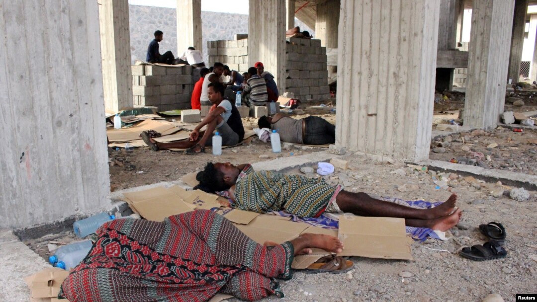 Ethiopian migrants sleep in an under-construction building in Aden, Yemen, June 15, 2020.