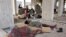 Ethiopian migrants sleep in an under-construction building in Aden, Yemen, June 15, 2020.