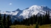 FILE - Mount Rainier is pictured Sept. 21, 2023, at Mount Rainier National Park, as seen from Sunrise, Washington. A U.S. Navy EA-18G Growler jet crashed east of Mount Rainier Tuesday in a remote, steep and heavily wooded area, killing both crew members on board.